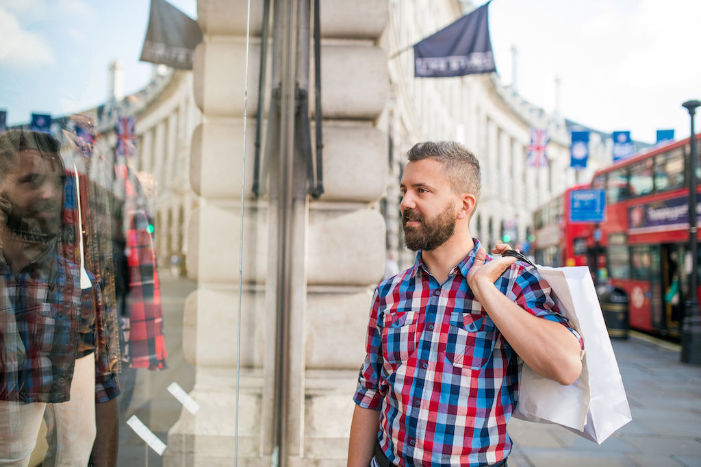 Man With Shopping Bag on Streets of London